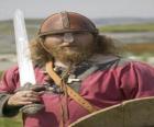 bir kılıç ve bir kalkan ile silahlı Viking